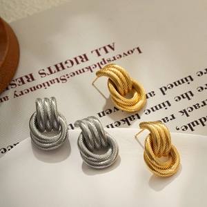 18K gold and silver intertwined triple loop earrings with braided wire texture