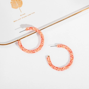 Bohemian coral orange polymer clay hoop earrings with beaded texture for summer style