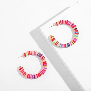 Colorful bohemian polymer clay Heishi bead hoop earrings with vibrant summer rainbow colors