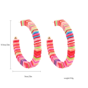 Detail showing 5.3cm x 5cm colorful polymer clay hoop earrings with size specifications