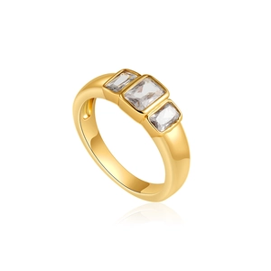 Bague luxe en or 18K avec zircons blancs taille émeraude et sertissage poli à trois pierres