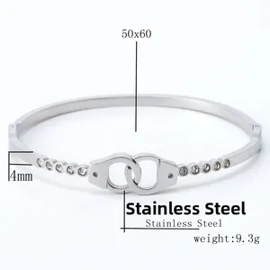 Detail of silver stainless steel handcuff bangle with dimensions and weight parameters