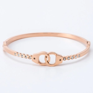 Elegant rose gold titanium steel handcuff bracelet with sparkling crystal accents
