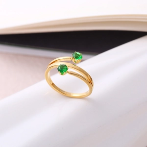 Creative gold stainless steel wrap ring featuring two round emerald green stones