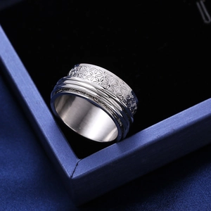 Leaf floral pattern stainless steel spinner ring for stress relief in silver finish