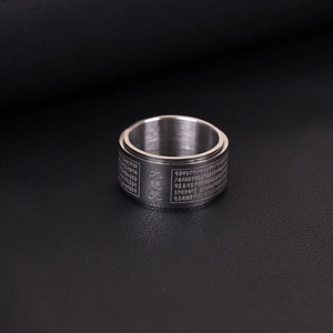 Bague bouddhiste rotative en acier inoxydable avec mantras gravés sur cuir noir