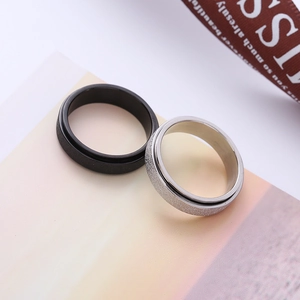Schwarze und silberne drehbare Anti-Stress-Ringe aus Edelstahl mit Mattierung