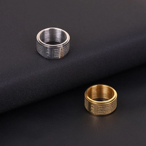 Bague mantra rotative en acier inoxydable avec caractères bouddhistes en finitions or et argent