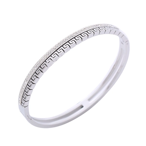 Silver stainless steel oval bangle featuring Greek key pattern and sparkling crystal inlay