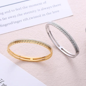 Minimalist stainless steel open bangle set in gold and silver with sparkling crystals