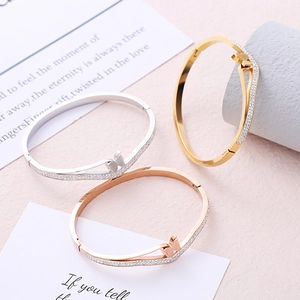 Elegant butterfly open bangle set in gold, silver, and rose gold with zircon accents