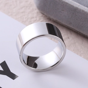 Polished 10mm wide stainless steel band ring with minimalist 18K silver mirror finish