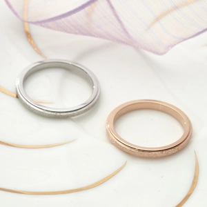 Set of 2mm matte stainless steel rings in silver and rose gold finishes for women