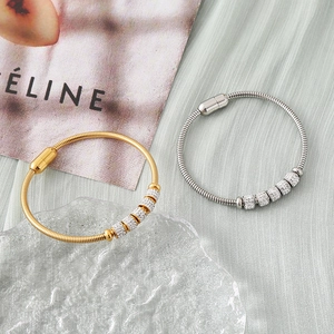 Minimalist stainless steel snake chain bracelet with magnetic clasp and sparkling charms