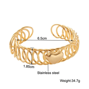 Stainless steel woven bangle with heart charm, 6.5cm diameter polished gold jewelry