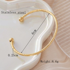 Golden spiral pattern C-shape stainless steel bracelet with ball ends and 6cm inner diameter