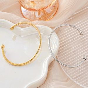 Minimalist spiral engraved stainless steel C-shaped cuff bangle in gold and silver