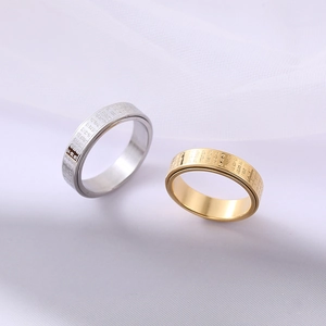 Rotating stainless steel Buddhist Heart Sutra rings in gold and silver finish