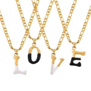 Gold titanium steel necklace featuring LOVE pendants with black and white enamel details
