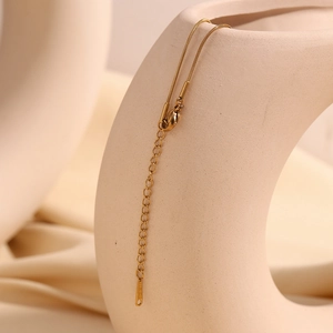 Detail of 18K gold-plated stainless steel snake chain with lobster clasp and extender