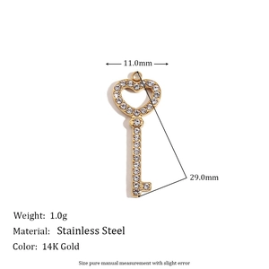 Miniature 14K gold plated stainless steel heart key pendant with pavé white zircons