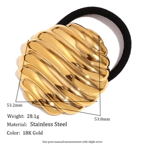 Polished 18K gold stainless steel hair tie featuring a minimalist wavy shell design