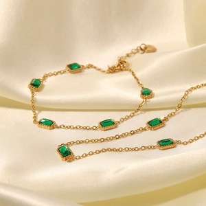 Square emerald zircon bracelet with gold-plated titanium steel chain on white silk