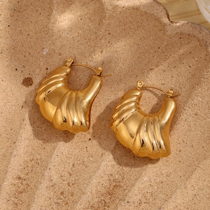 Detailed close-up of 18K gold-plated stainless steel hollow croissant hoop earrings