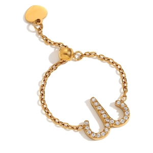 Bague chaîne réglable dorée à l'or 18 carats avec symbole en zircon et cœur