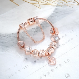 Bracelet maille serpent or rose classique avec perles cristal et pendentif coeur
