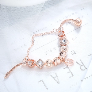 Bracelet maille serpent or rose classique avec breloques cœur et zircons brillants