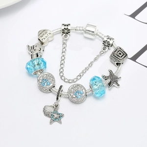 Ocean theme DIY charm bracelet with blue crystal beads, starfish and heart pendant