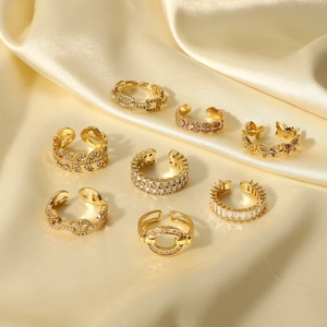 Detailed set of seven 18K gold-plated rings with zircon butterfly and leaf motifs