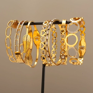 Bracciale Rigido in Acciaio al Titanio con Strass alla Moda per Donna Bracciale Aperto a Forma di Cuore Piuma Geometrico Placcato Oro