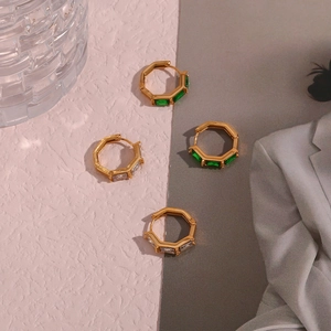 Octagonal gold-plated earrings set with emerald green and clear zircon stones