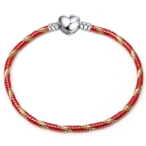 Red and gold 3mm woven rope bracelet featuring a polished silver heart shaped clasp