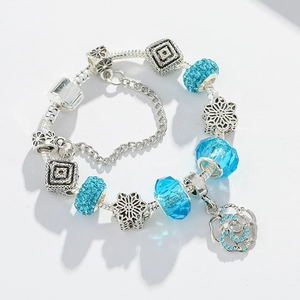Luxurious silver snake chain bracelet with blue crystal beads and flower pendant charms