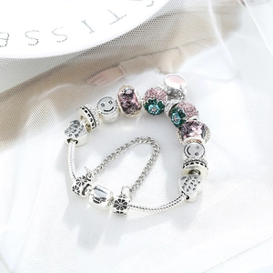 Classico bracciale con ciondoli in argento con calice di vino e perla a cuore