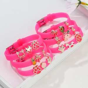 Pink silicone charm bracelet for kids with adjustable buckle and unicorn charms