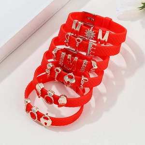 Adjustable red silicone 10mm strap bracelet with rose gold charms and heart pendants