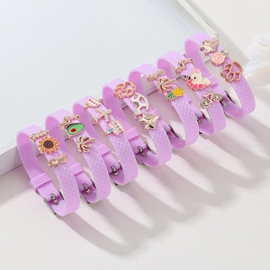 Set of seven purple adjustable silicone charm bracelets with cute enamel sunflower beads