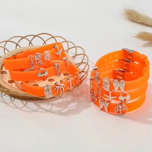Adjustable 10mm orange silicone bracelets with silver charms like Eiffel Tower and camera