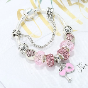 Rosa Herzschloss und Schlüssel Charm-Armband mit Kristallperlen auf silberner Schlangenkette