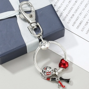 Silver beaded keychain with red heart, lips, high heel, and lipstick charms for Valentine