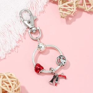 Fashion keychain with red high heels and lipstick charms on a round ring with lobster clasp