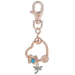 Rose gold heart keychain with blue dragonfly, butterfly and daisy flower pendants