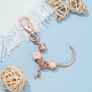 Rose gold beaded keychain with heart charms and dreamcatcher pendant Mother's Day gift