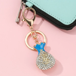 Golden money bag keychain with blue enamel and rhinestones for women handbag