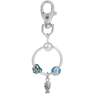 Detail of silver globe, fish, and heart charms with Happy Journey engraving on a clasp