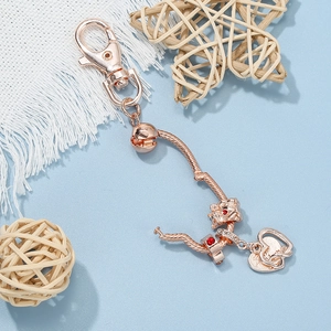 Rose gold keychain with bulldog and heart charms on a snake chain with lobster clasp